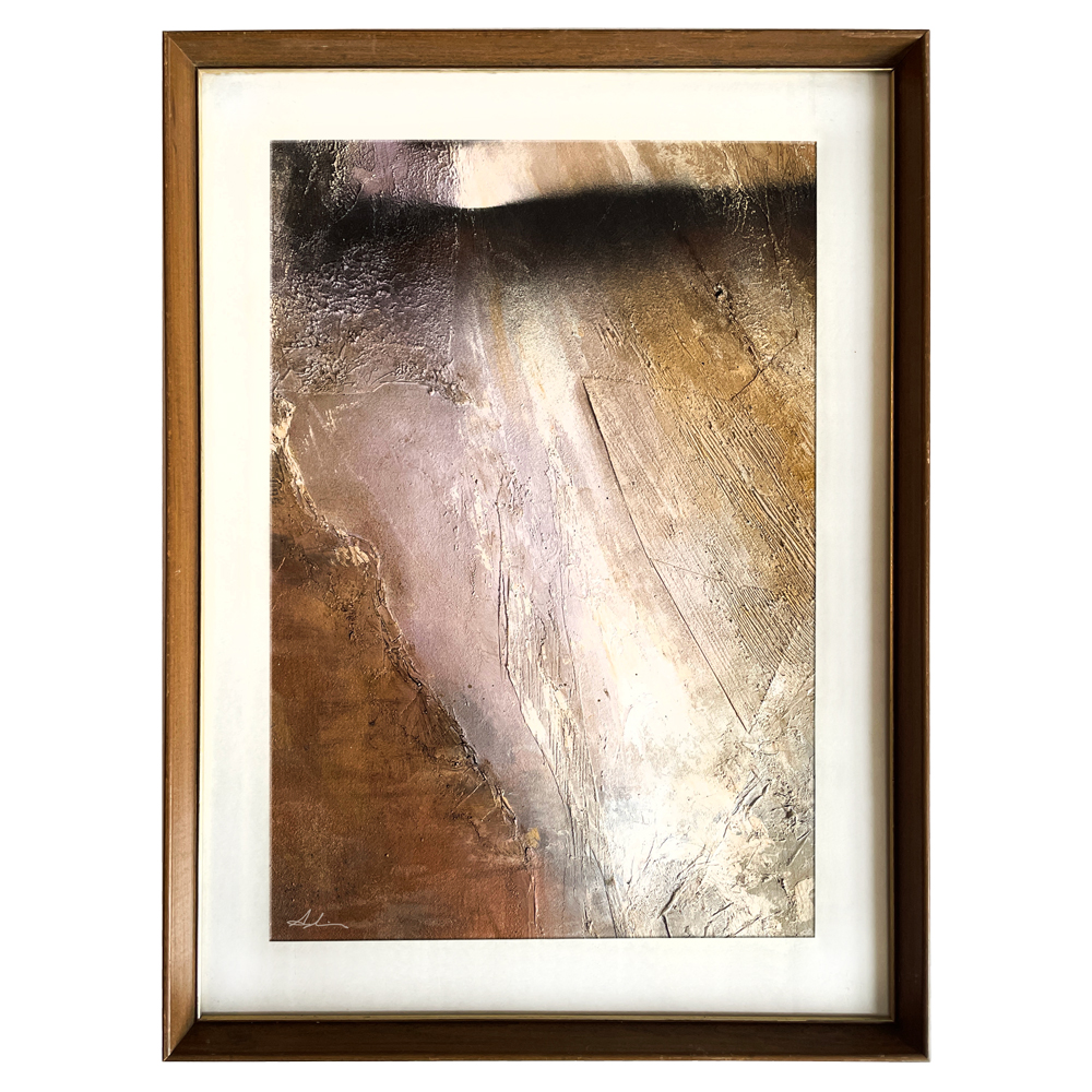 Textured abstract painting with rich earth tones of brown, gold, and lavender, a luminous diagonal of light cutting through dark shadow, displayed in a wooden frame with white mat, by Joanna Aplin, Canadian fine artist.